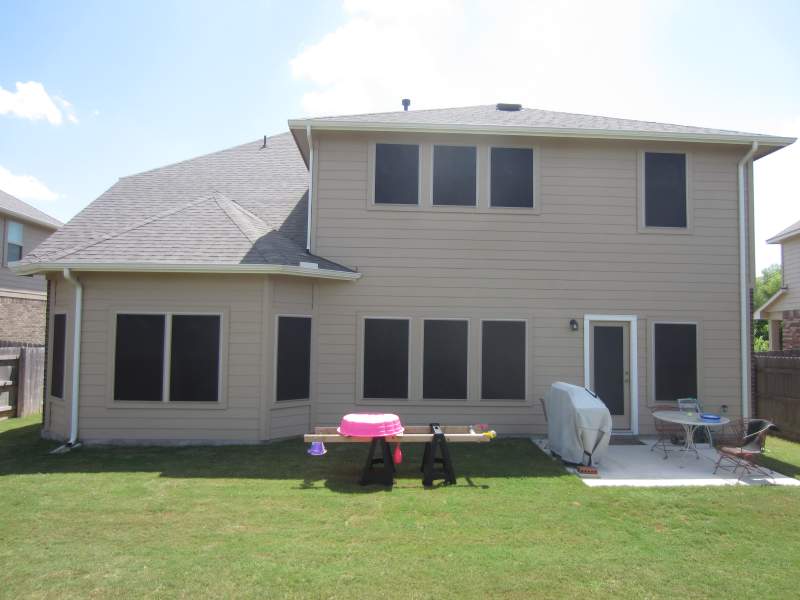 This Pflugerville TX home is wearing our 90% solar screens.  Even on the back door.  The back door even has a 90% solar window screen.  